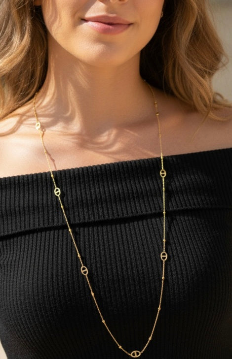 Sautoir maillon ovale et perles couleur or.Acier inoxydable, dorée ou argenté, ajustable ￼