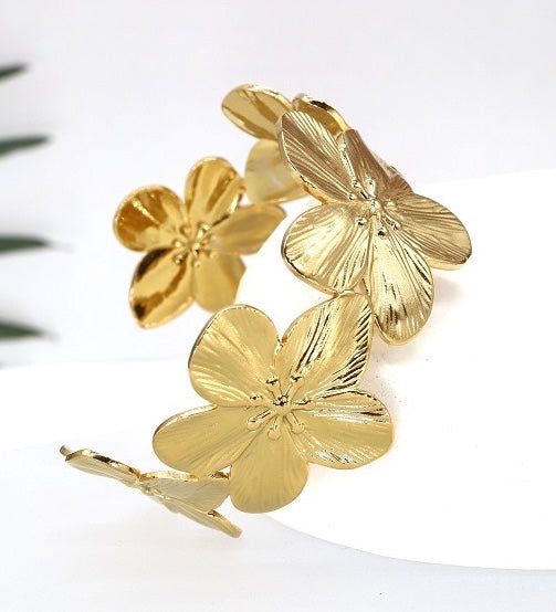 Jonc fleur tous le long du bracelet doré ou argenté