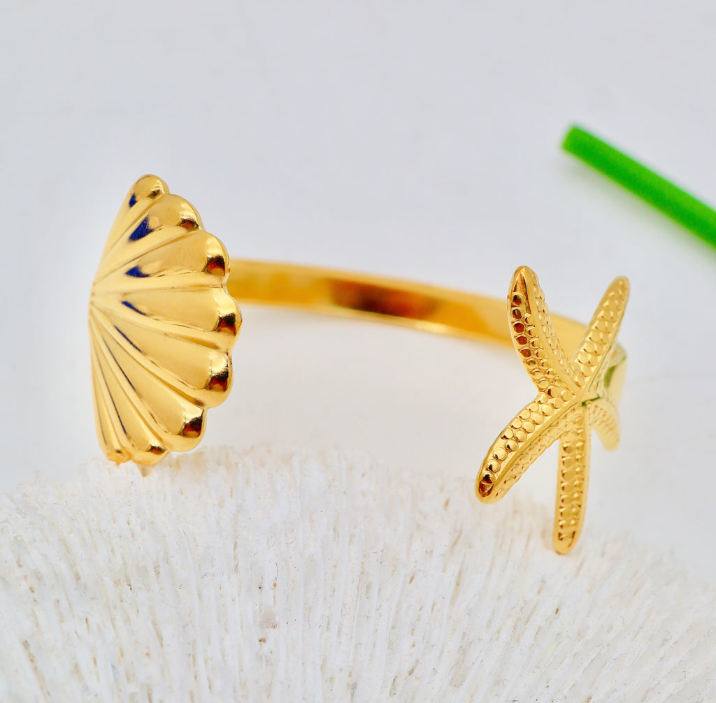 Bracelet manchette coquillage & étoile de mer en acier inoxydable doré