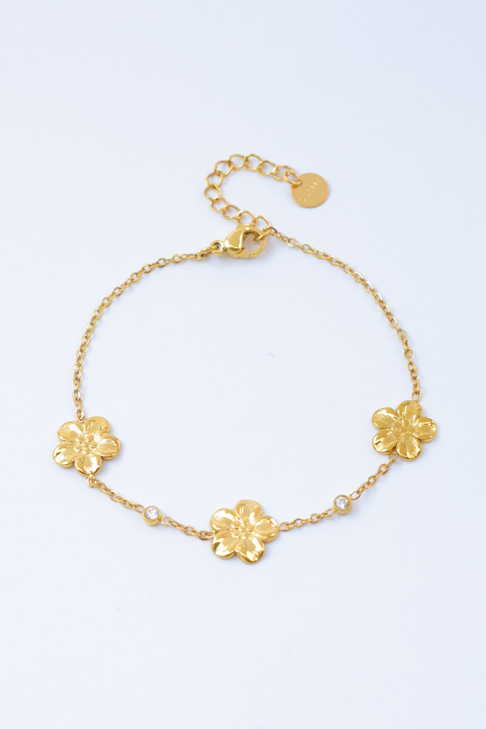 Bracelet fleurs délicates séparées d’un zircons– Acier inoxydable (Or ou Argent)